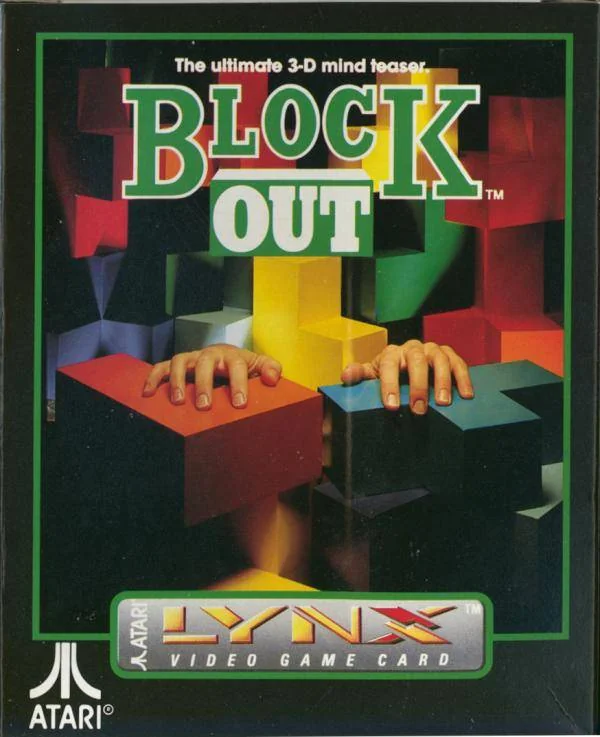 Frontal de la capsa nord-americana de Blockout per a Atari Lynx, amb dues mans entre peces cúbiques de colors.