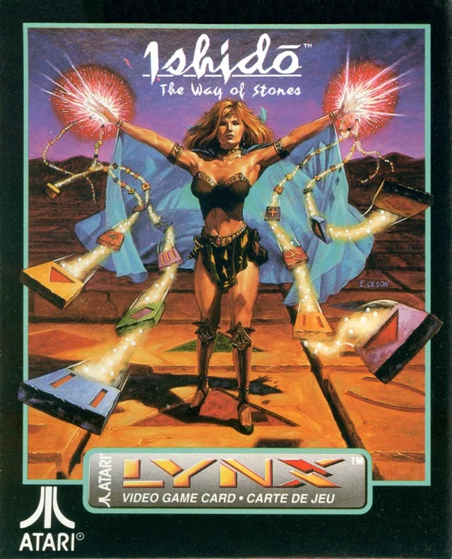 Portada nord-americana d’Ishido: The Way of Stones per a l’Atari Lynx, amb una figura femenina i pedres suspeses al seu voltant.