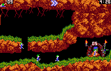 Lemmings al camí inferior d’una cova de terra i herba, amb la sortida situada a la dreta.