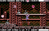 Ryu penja d’una canonada horitzontal en un escenari industrial vermell, amb un adversari blanc al damunt.