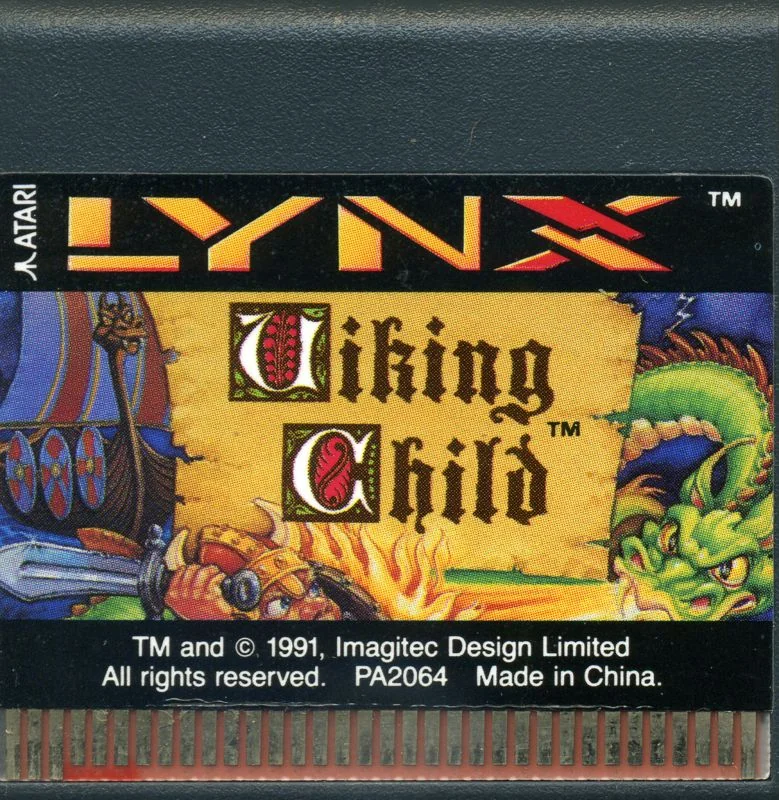Targeta de l’Atari Lynx de Viking Child amb etiqueta il·lustrada, codi PA2064 i contactes visibles.