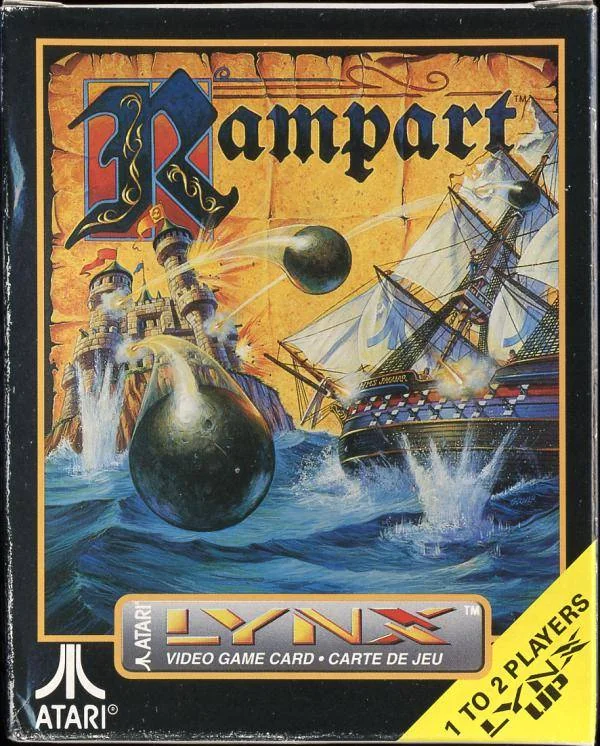 Frontal nord-americà de Rampart per a Atari Lynx, amb un castell i un vaixell entre projectils.