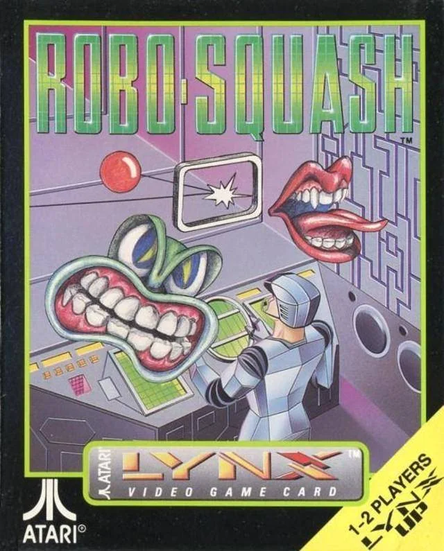 Frontal de la capsa nord-americana de Robo-Squash per a Atari Lynx, amb boques flotants, una pilota vermella i una figura davant d’una consola.