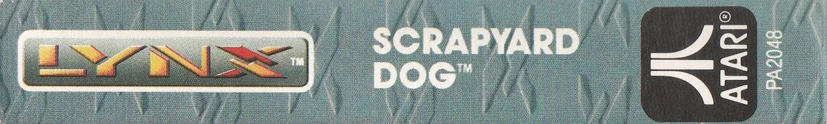 Lateral de la capsa amb el nom Scrapyard Dog, els logotips de Lynx i Atari i el codi PA2048.