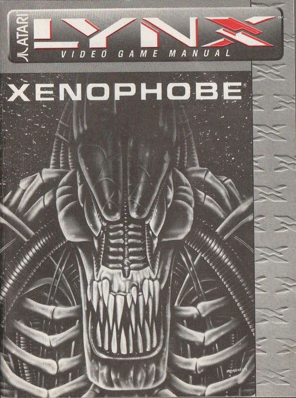 Portada en blanc i negre del manual de Xenophobe per a l’Atari Lynx, amb una criatura de grans dents.