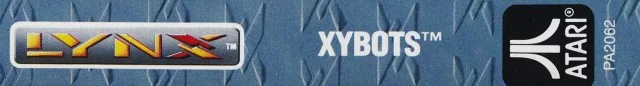 Lateral blau de la caixa de Xybots amb els logotips de Lynx i Atari i la referència PA2062.