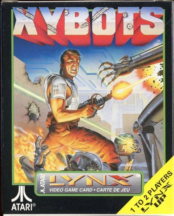 Frontal nord-americà de Xybots per a l’Atari Lynx, amb un guerrer disparant contra robots i el distintiu ComLynx.