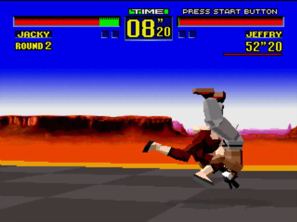 Jeffry projecta Jacky cap per avall durant un assalt de Virtua Fighter per a Sega 32X.