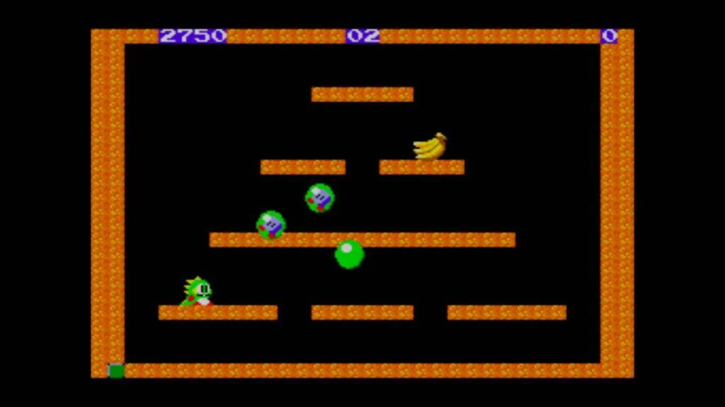 Ronda activa de Bubble Bobble amb Bubblun, dos enemics, una bombolla, plataformes i un plàtan.