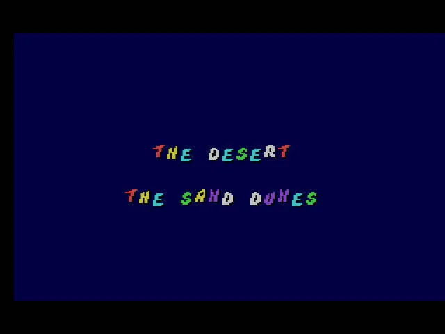 Pantalla de selecció de zona amb les opcions The Desert i The Sand Dunes.