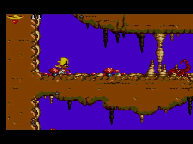 Speedy Gonzales en una cova entre bolets, estalactites i criatures vermelles.