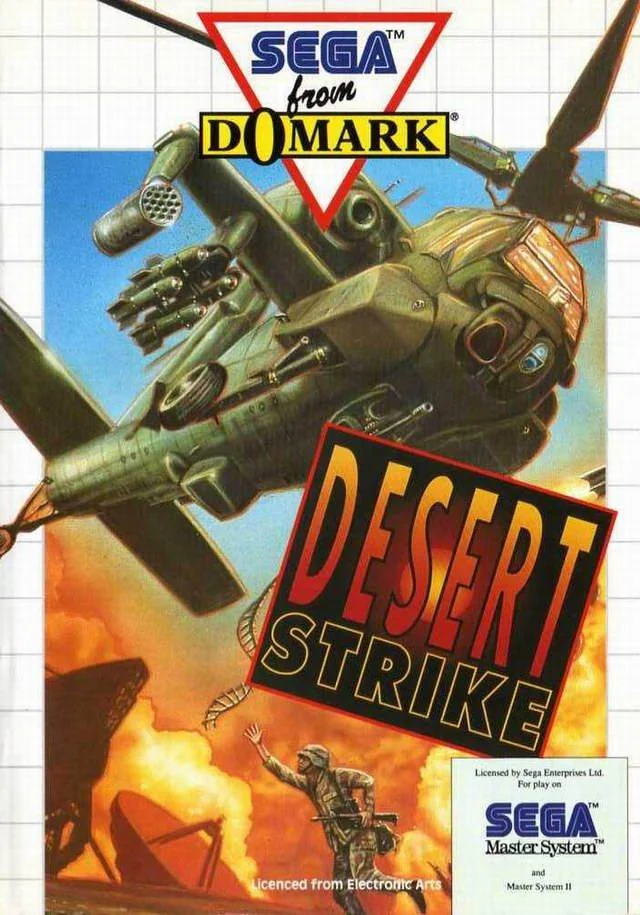 Portada europea de Desert Strike per a Sega Master System, amb un helicòpter armat davant d’una explosió.