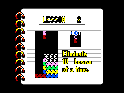 Lliçó 2 de Puzzle Mode, amb l’ordre d’eliminar deu mongetes alhora i un diagrama d’exemple.