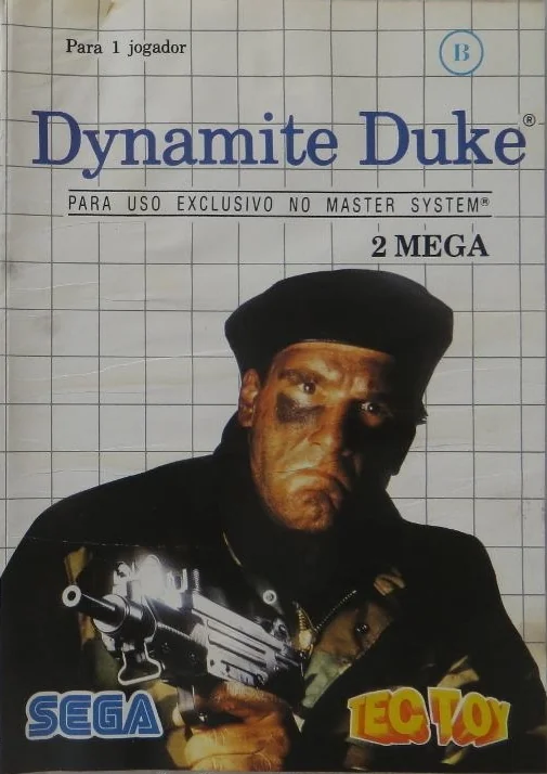 Portada brasilera de Dynamite Duke amb els logotips de Sega i Tec Toy i la indicació 2 MEGA.