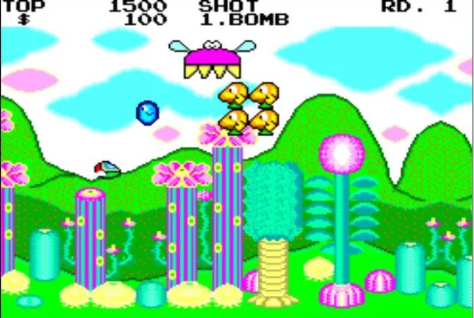 Opa-Opa vola entre enemics i bases acolorides durant la primera ronda de Fantasy Zone.
