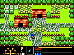 Un poble de Golden Axe Warrior envoltat d’arbres, amb cases, camins i el protagonista al centre.