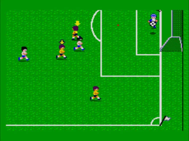 Atac de Great Soccer prop de l'àrea, amb fletxes que assenyalen futbolistes i la pilota a prop del porter.
