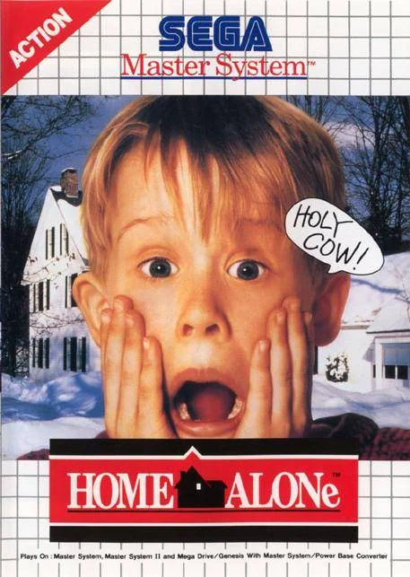 Portada frontal europea de Home Alone per a Sega Master System, amb Kevin davant d’una casa nevada.