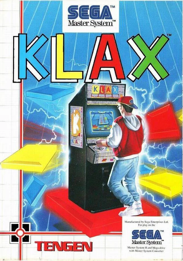 Portada frontal europea de Klax per a Sega Master System amb una recreativa, un jugador i fitxes de colors.