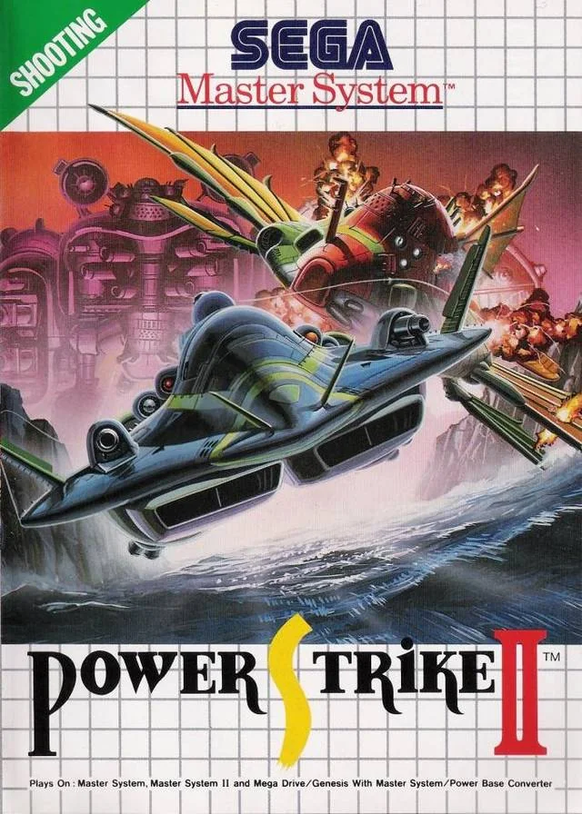 Portada europea de Power Strike II per a Sega Master System, amb una aeronau davant d’una màquina en flames.