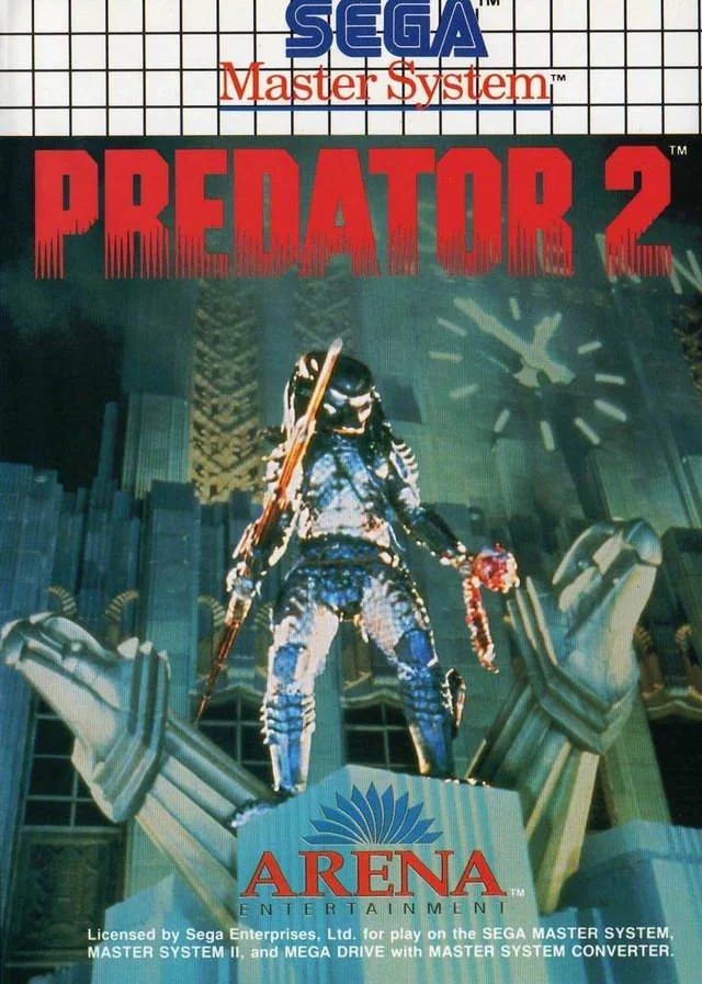 Portada europea de Predator 2 per a Sega Master System, amb el Predator davant de la ciutat.
