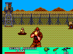 Partida de Rambo III en un campament, amb un soldat al centre, enemics al fons i el marcador inferior.