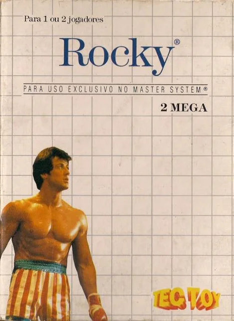 Portada brasilera de Rocky per a Master System, amb el logotip de Tec Toy sota la quadrícula clara.