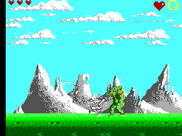 Una criatura verda davant d’un esquelet en un paisatge muntanyós de Shadow of the Beast.