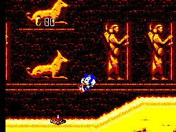 Sonic avança per Yellow Desert Zone entre figures egípcies, enemics flamejants i un curs de lava.