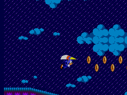 Sonic plana amb una ala delta sota la pluja, entre núvols i fileres d’anells.