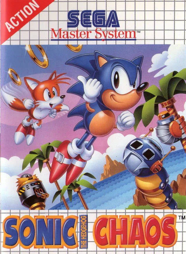 Caràtula frontal europea de Sonic the Hedgehog Chaos per a Sega Master System, amb Sonic i Tails entre anells i robots.