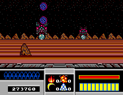 Combat exterior en un paisatge extraterrestre, amb enemics aeris, mira i panell d’estat.