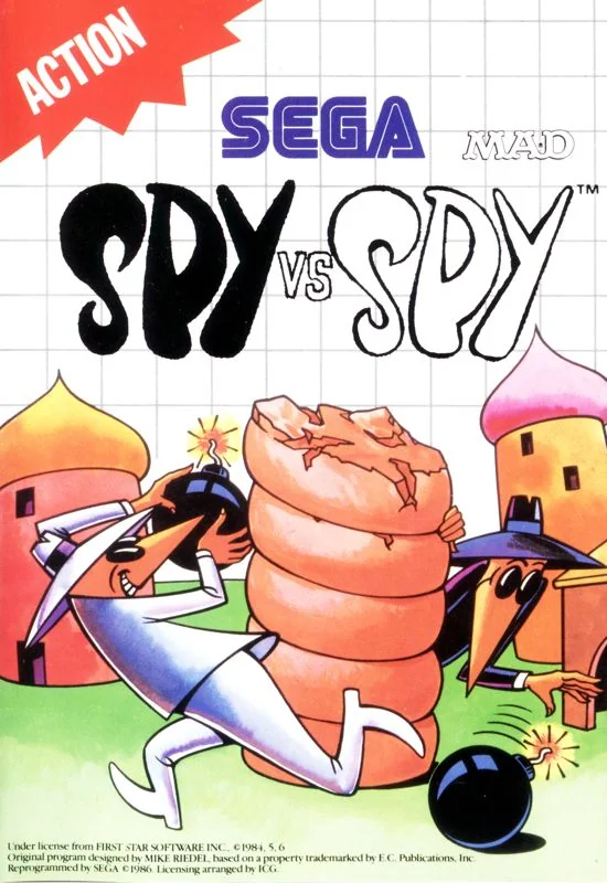 Portada europea de Spy vs Spy per a Sega Master System, amb els espies blanc i negre, bombes i un sac.