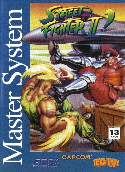 Portada brasilera de Street Fighter II per a Sega Master System, amb M. Bison colpejant Guile.