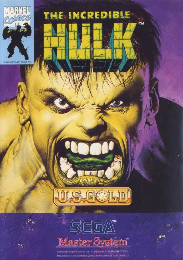 Caràtula frontal europea de The Incredible Hulk per a Sega Master System, dominada pel rostre il·lustrat de Hulk.