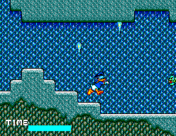 Donald Duck neda entre parets rocoses i plataformes verdes en una secció subaquàtica.