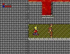 Bart davant d’un adversari en un passadís egipci de pedra amb paviment verd