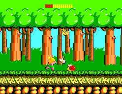 Tom-Tom llança una destral contra un cargol en un bosc.