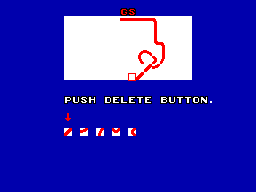 Editor de World Grand Prix amb un traçat vermell parcial, peces disponibles i la instrucció PUSH DELETE BUTTON.